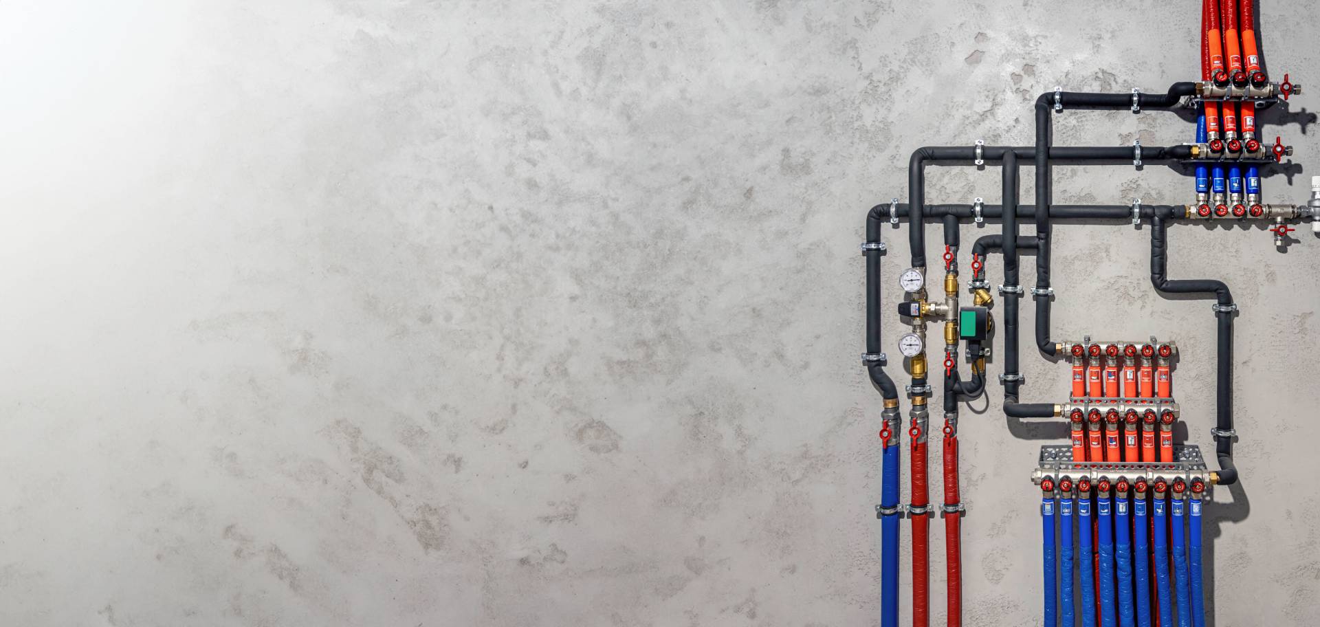 pipes-and-plumbing-system-on-concrete-wall-2026-03-23-23-30-44-utc_1
